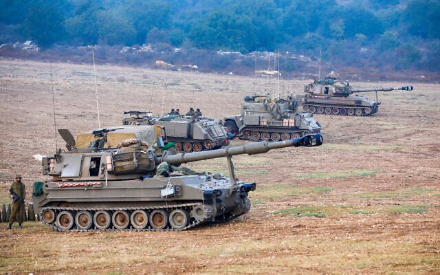 Image in @MarioNawfal's post: 🚨BREAKING: Israeli armor, including Merkava Mark III and IV tanks, and self-propelled artillery bat…