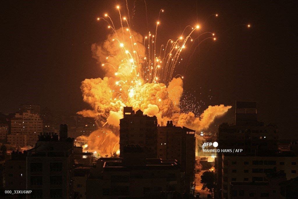 Image in @MarioNawfal's post: 🚨JUST IN: Reports of an ammunition depot in Gaza hit by airstrikes.