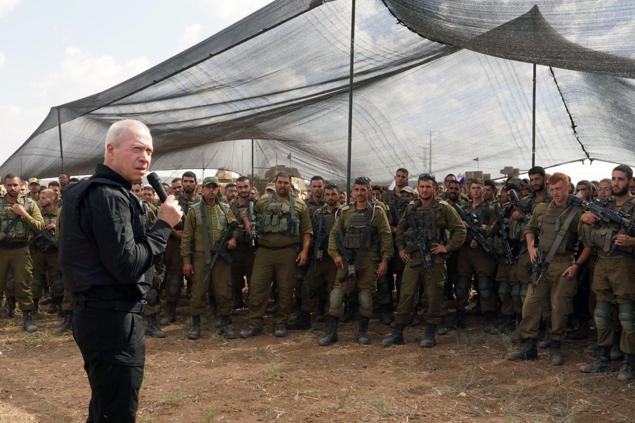 Image in @MarioNawfal's post: 🚨Defense Minister Yoav Gallant to troops on the Gaza border:
"You now see Gaza from afar, soon yo…