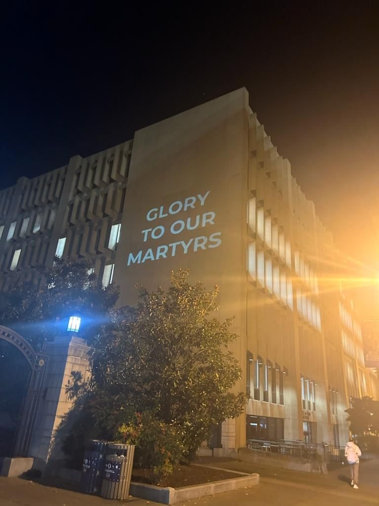 Image in @MarioNawfal's post: 🇺🇸🇵🇸 Students at the George Washington University project the following messages on the campus:
"G…