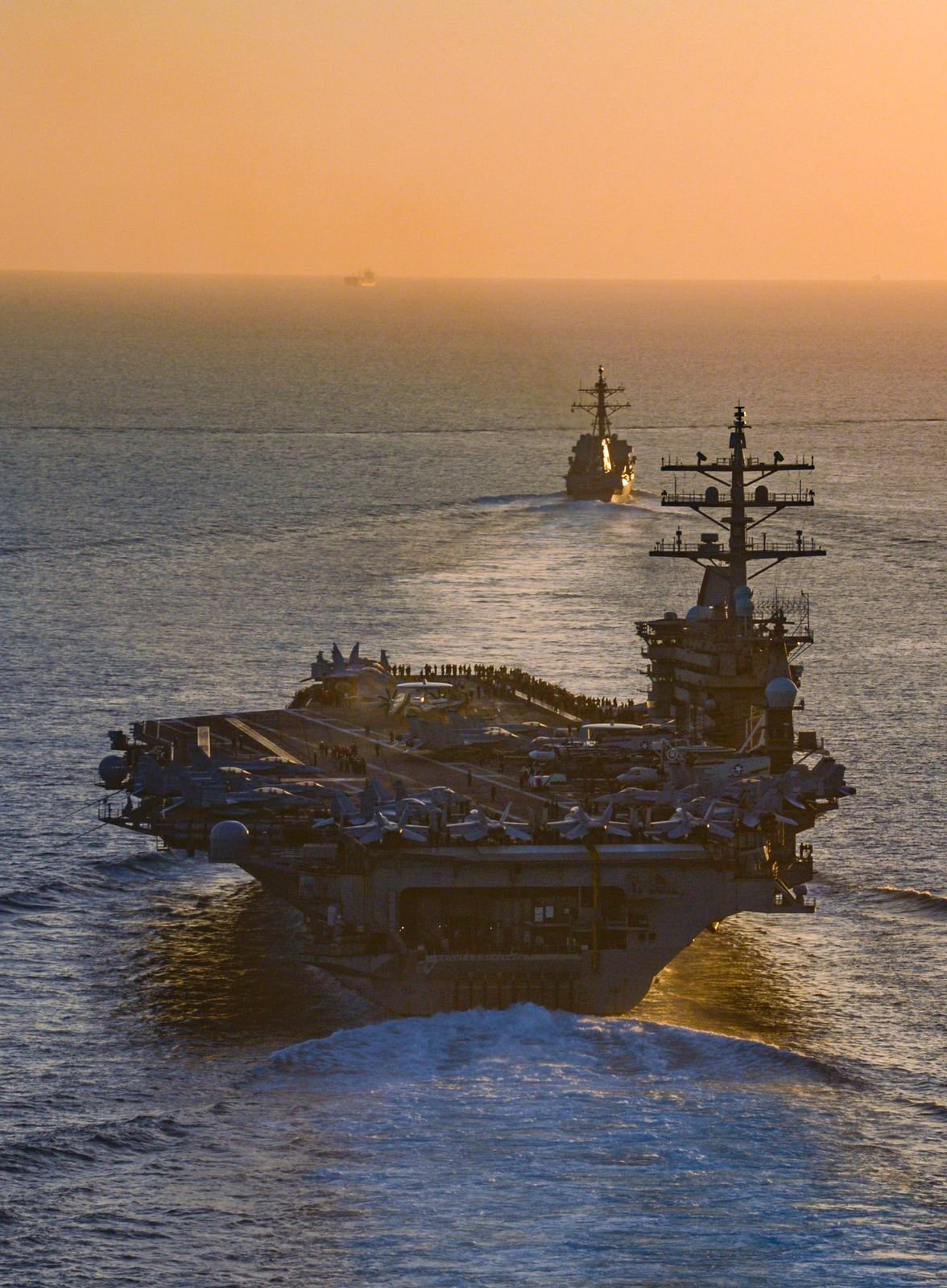 Image in @MarioNawfal's post: 🚨IMAGES: The U.S Dwight D. Eisenhower Carrier Strike Group transits the Strait of Gibraltar.