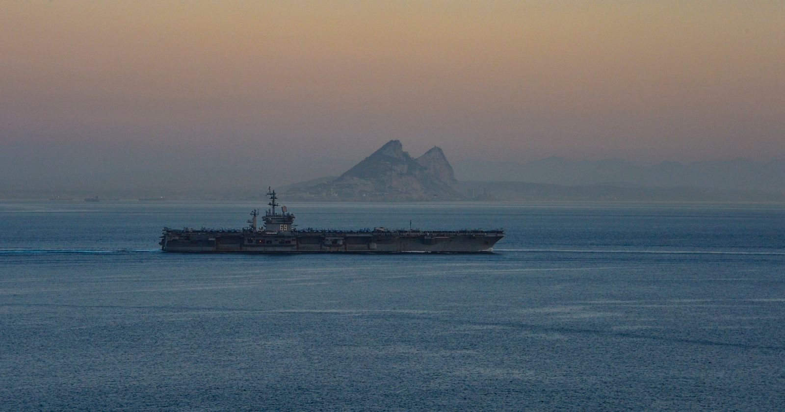 Image in @MarioNawfal's post: 🚨IMAGES: The U.S Dwight D. Eisenhower Carrier Strike Group transits the Strait of Gibraltar.