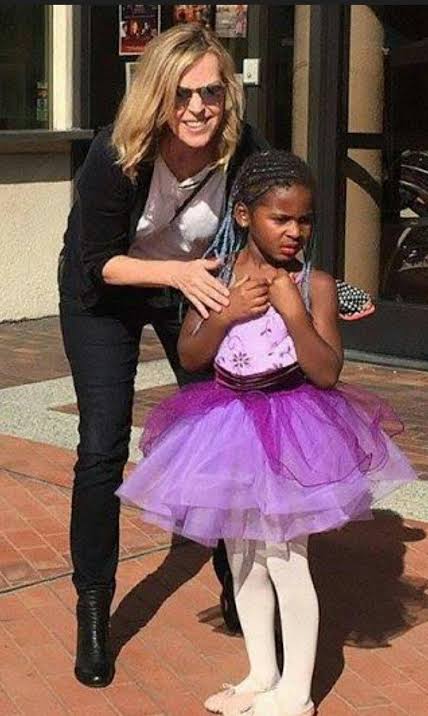 Image in @IfindRetards's post: Charlize Theron with her son.
Another celebrity with a trans child. Shocking. https://t.co/7R3ybn…