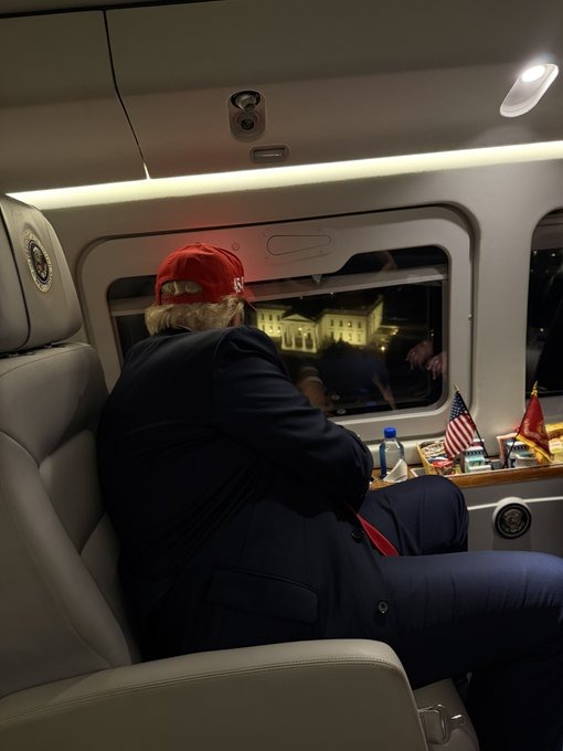 Image in @MarioNawfal's post: 🇺🇲 Trump was snapped inside Marine One looking down at the majesty of the White House and thought t…