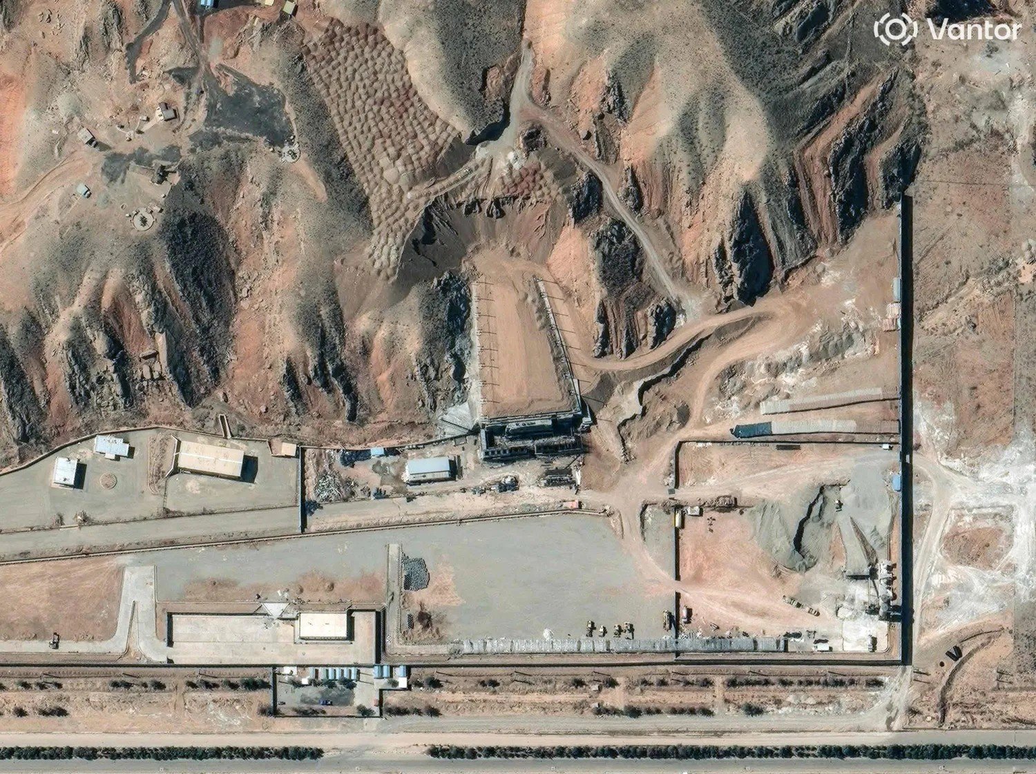 Image in @MarioNawfal's post: 🇮🇷🇮🇱 Iran is reportedly rebuilding Taleghan 2 at the Parchin military complex after Israeli strikes…