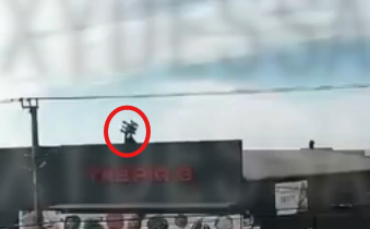 Image in @DavetheRadTrad's reply: @MarioNawfal Is that an anti-aircraft gun on top of what is supposed to be a civilian supermarket? …